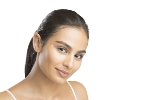 Portrait of smiling young woman looking at camera