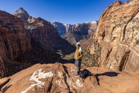 Senior female hiker at overlook of Zion National Park