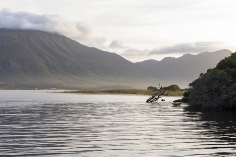 Lagoon and Klein mountains at sunset
