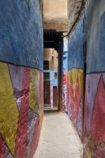 Colorful walls in alleyway in medina