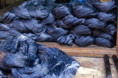Skeins of agave silk freshly dyed in indigo