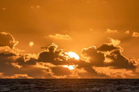 Dramatic sky at sunset over sea