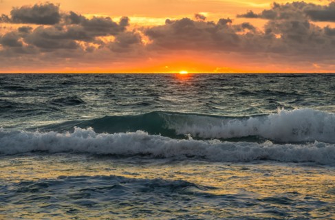 Dramatic sky at sunset over sea