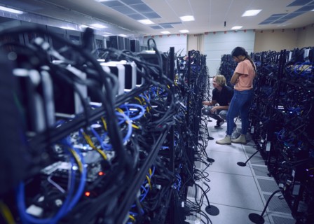 Technicians working in server room