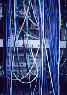 Tangled computer cables in server room