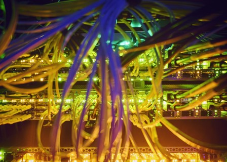 Close-up of tangled computer cables in server room