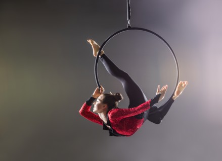 Teenage aerialist (14-15) performing aerial dance