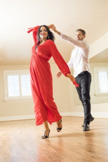 Couple dancing in empty apartment