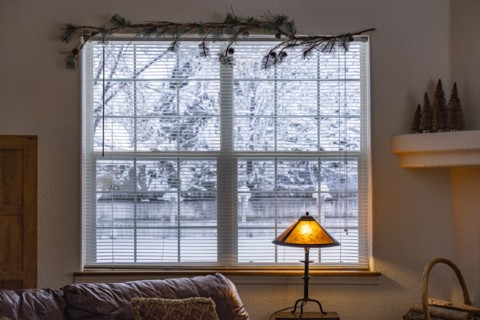 View from living room to snowy outdoors