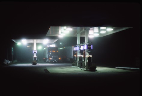 Truck on gas station at night