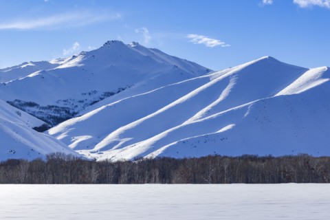 Winter landscape with snowy mountains