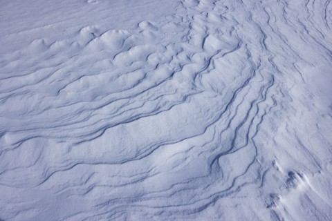 Abstract patterns on snow, full frame