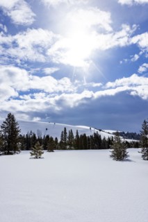 Sunny day in mountains at winter