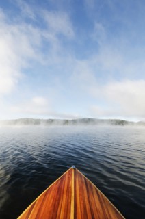 Boat on Lake Placid in morning mist
