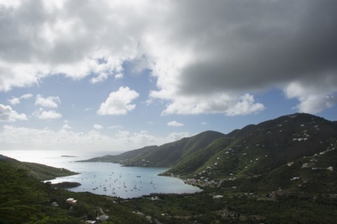 Thick clouds over Coral Bay with sailboats
