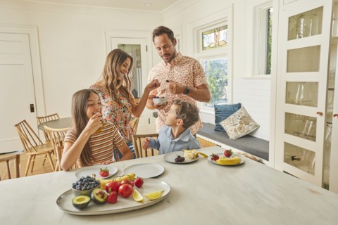 Smiling family with two children