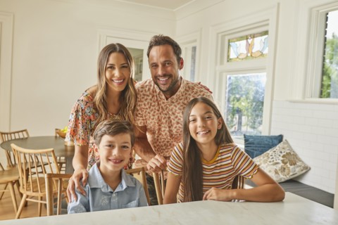 Portrait of smiling family with two children