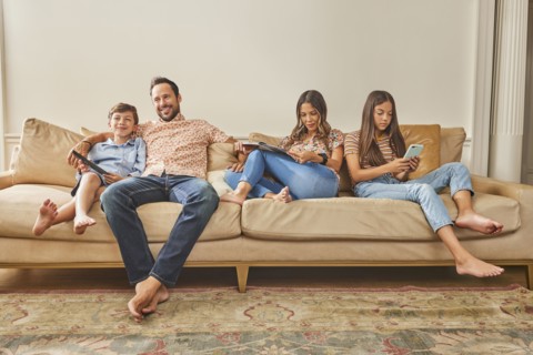 Smiling family with two children