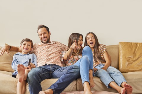 Smiling family with two children