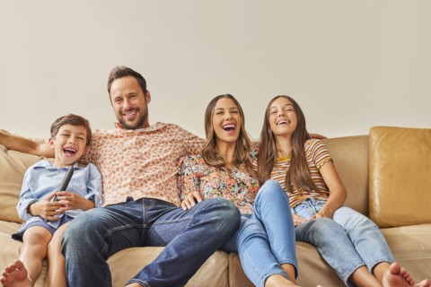 Smiling family with two children