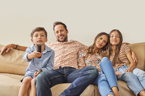 Smiling family with two children