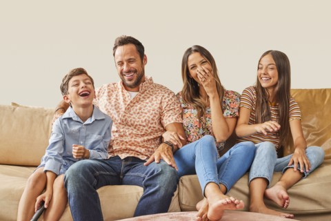 Smiling family with two children