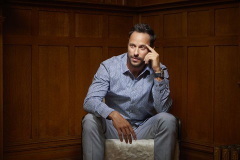 Mid adult man sitting on chair