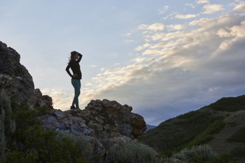 Mid adult woman hiking in mountains