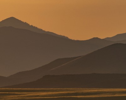 Scenic view of mountain landscape at sunset