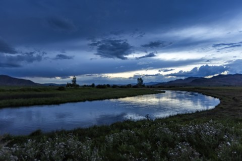 Reflection of evening storm in Silver Creek