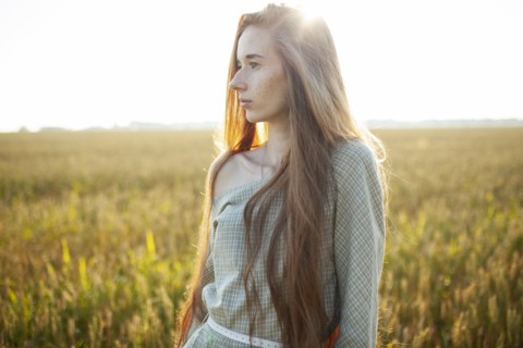 Beautiful woman posing in rural area