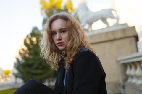 Portrait of serious woman looking at camera