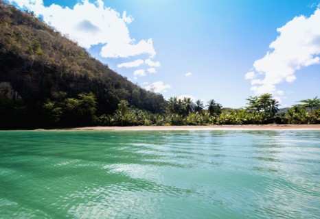 Turquoise water and hills on sunny day, , West Indies, St Lucia
