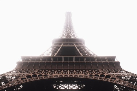 Low angle view of Eiffel Tower in mist, Paris, , France