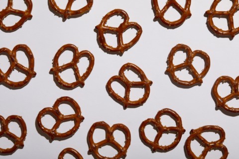 Overhead view of pretzels on white background, New York, NY, USA