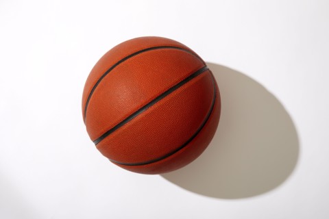 Overhead view of basketball on white background, New York, NY, USA