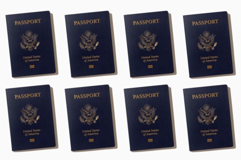 Rows of American passports on white background, New York, NY, USA