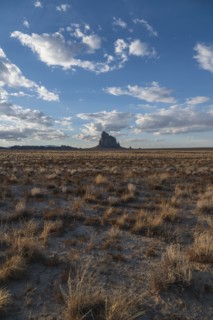Usa, New Mexico, Shiprock, Clouds over desert landscape with Shiprock, Shiprock, New Mexico, USA