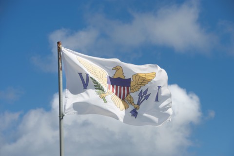 Flag of the United States Virgin Islands against sky, St. John, United States Virgin Islands, USA