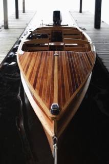 Wooden motorboat at pier, , New York, USA