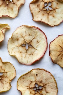 Close-up of baked apple slices on white background, New York, New York, USA