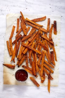 Overhead view of sweet potato fries and small bowl of ketchup, New York, New York, USA