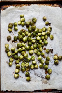 Overhead view of baked brussel sprouts on baking paper, New York, New York, USA