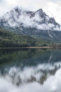 USA, Idaho, Clouds covering Sawtooth Mountains at Stanley Lake, Stanley, Idaho, USA