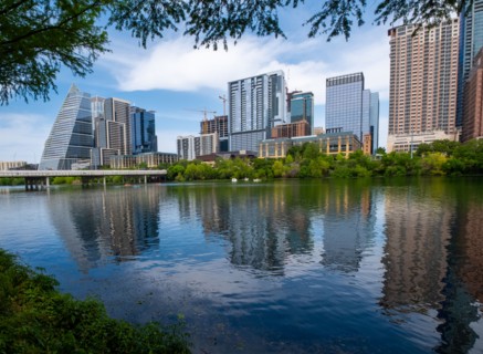 USA, Texas, Austin, Downtown buildings seen across river, Austin, Texas, USA