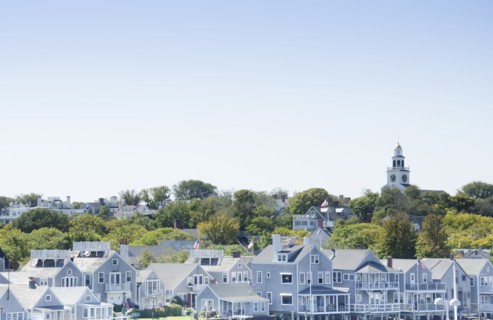USA, Massachusetts, Blue houses and tree on Nantucket Island, Nantucket, Massachusetts, USA