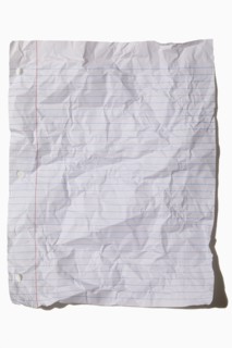 USA, New York State, New York City, Crumpled lined paper on white background, New York City, New