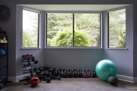 USA, New York, Irvington, Exercise equipment in home gym, New York City, New York, USA