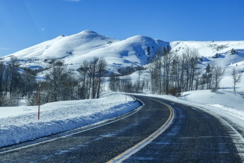 Winding interstate at snow covered foothills, Fairfield, Idaho, USA