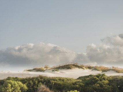 USA, North Carolina, Nags Head, Clouds over sand dunes, Nags Head, North Carolina, USA